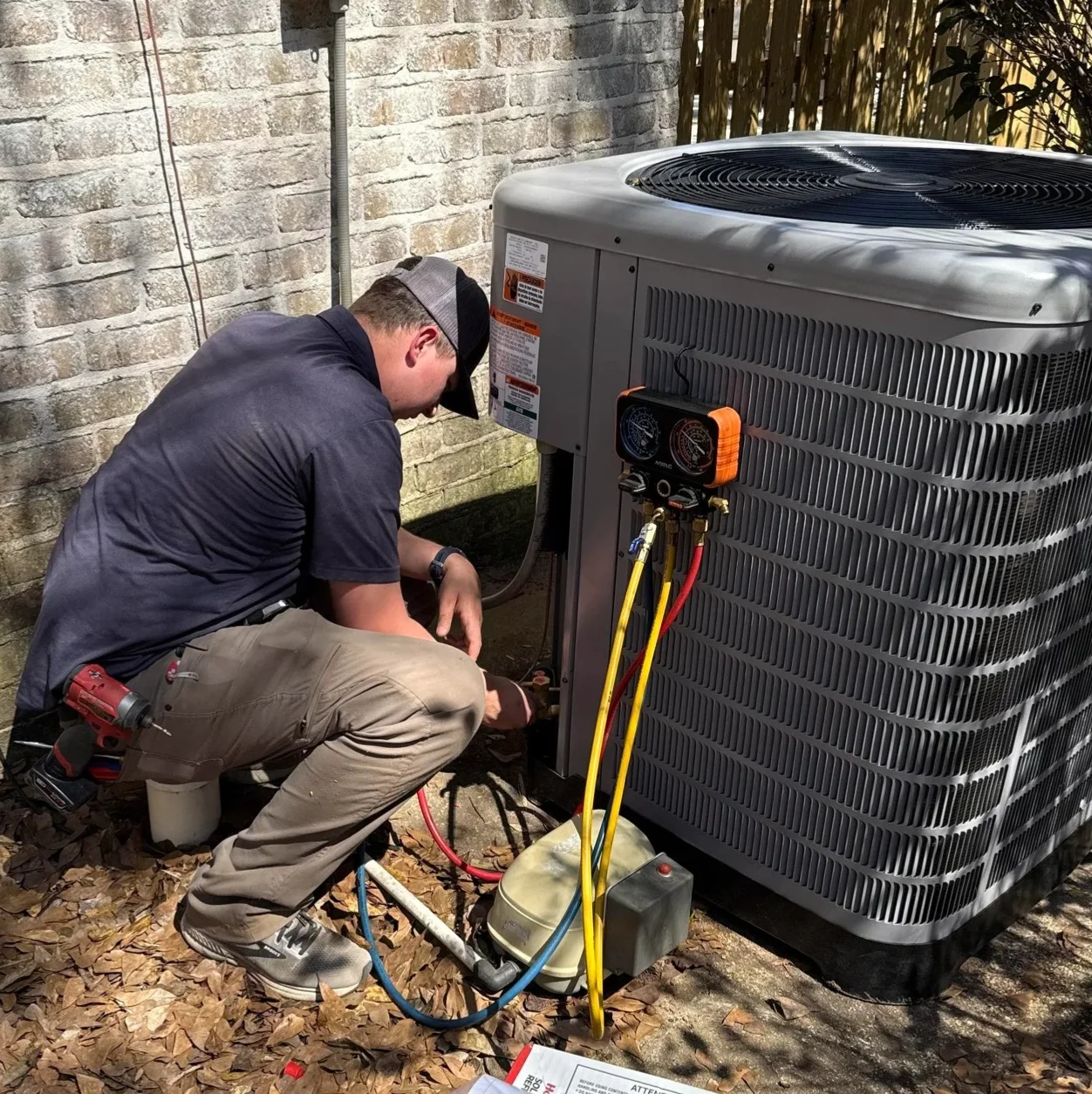 Hammond HVAC technician charging refrigerant