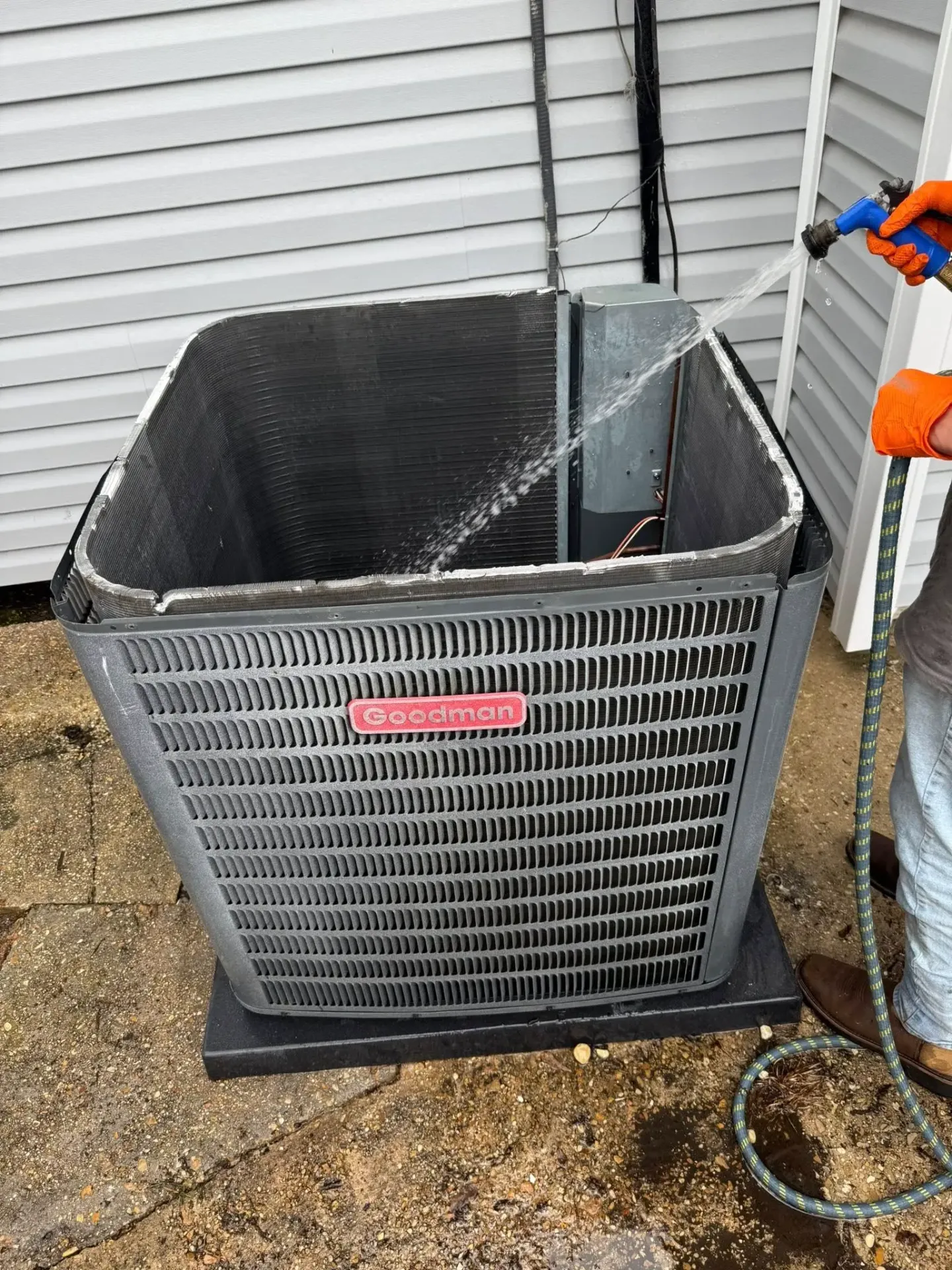 Technician performing AC tune-up in Hammond, LA
