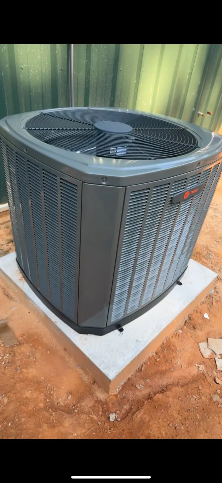 New Trane AC unit installed on concrete pad by TMAC